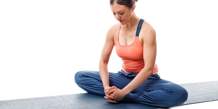 woman in yoga butterfly pose