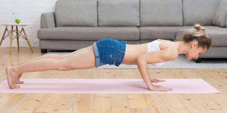 chaturanga dandasana, woman in four limbed staff pose